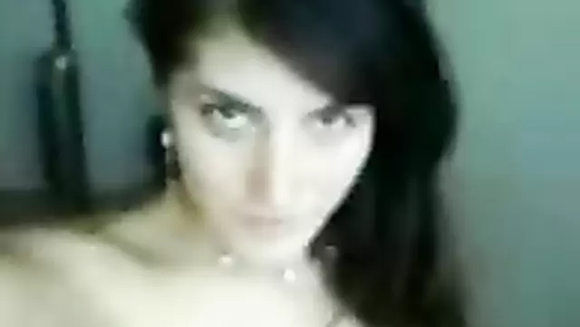 Girl from Kyrgyzstan poses on camera