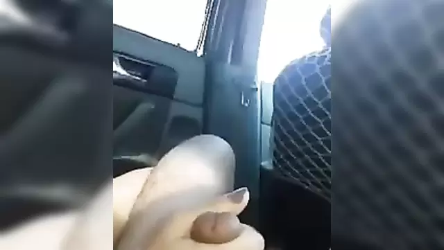 Bitch jerks off Kyrgyzstani cock in car